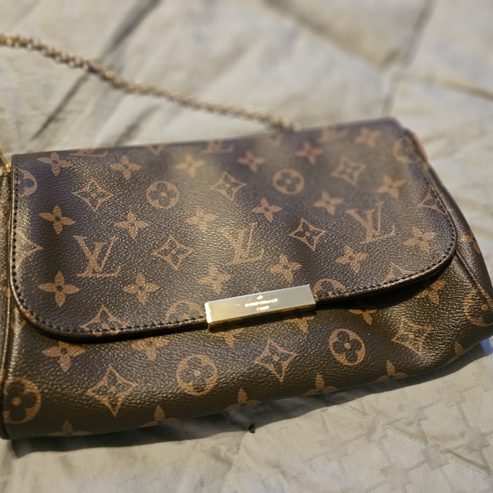 Authentic lv clutch with chain